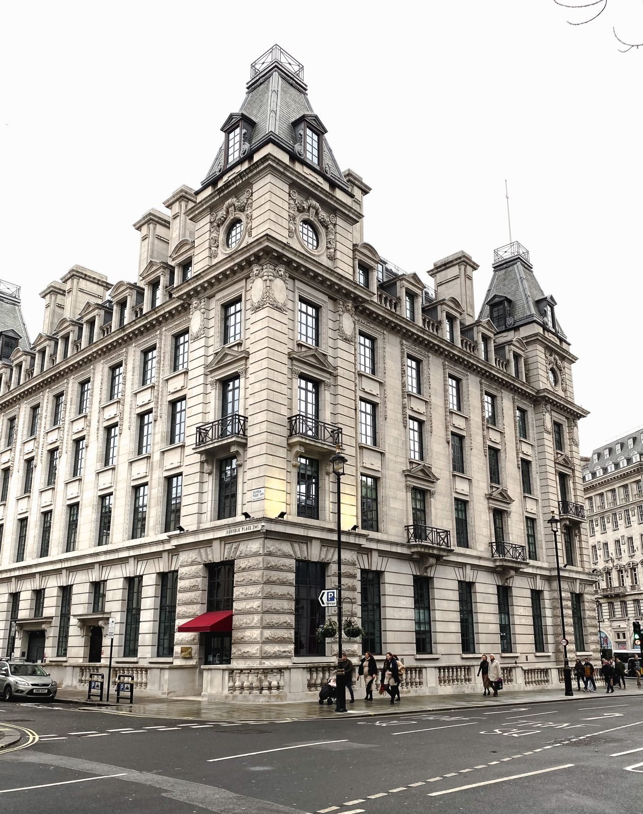 Stone corner building on Suffolk Place in central London
